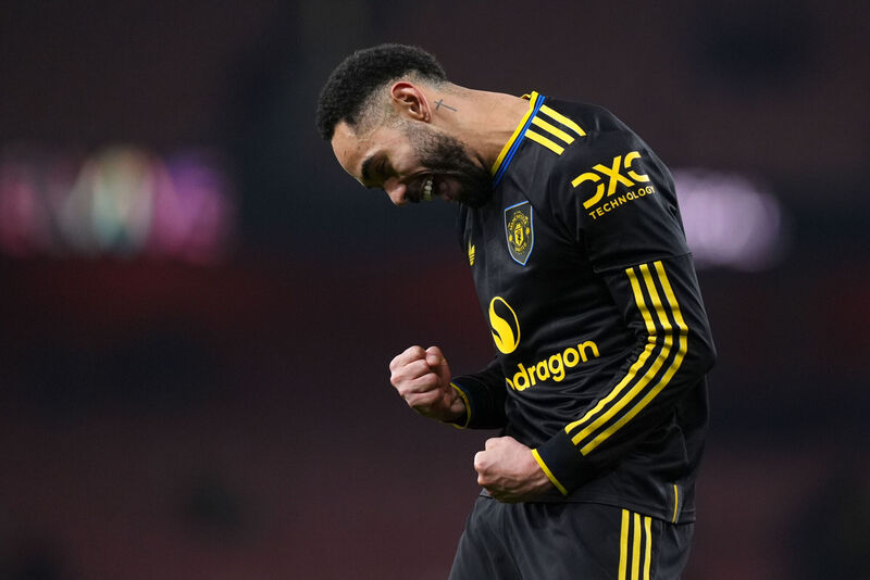 Manchester United's Matheus Cunha celebrates the win after the Premier League match at the Emirates Stadium, London. Picture: Mike Egerton/PA Wire. 