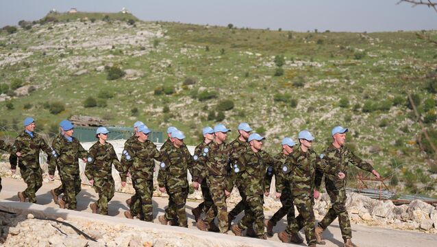<p>Irish troops on parade at Camp Shamrock near the Lebanon-Israel border. File picture</p>