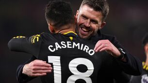 <p>Manchester United manager Michael Carrick celebrates the win at Arsenal with Casemiro. Pic: Mike Egerton/PA Wire.</p>