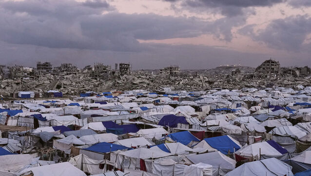 <p>A tent camp for displaced Palestinians stretches across the Zeitoun neighborhood of Gaza City. Picture: AP Photo/Jehad Alshrafi.</p>
