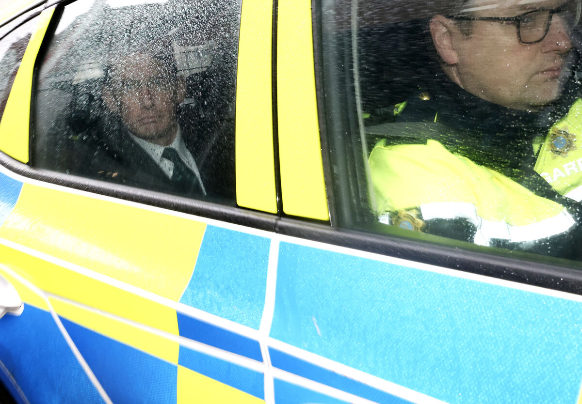 Enoch Burke in the back of a Garda car leaving the High Court last week. The court ordered he be returned to jail immediately for breaching a court order not to trespass at Wilson's Hospital school in Co Westmeath. Picture: Leah Farrell/ RollingNews.ie