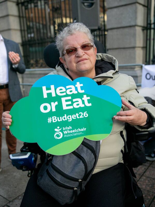 Carolyn Akintola at the demonstration by the Disability Coalition Warning outside Leinster House after Budget 26 left Disabled People €1400 worse off. Photo: Gareth Chaney