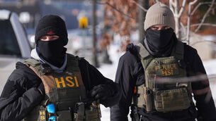 A judge has been asked to order a reduction in the number of federal law enforcement officers in Minnesota (Adam Gray/AP) A judge has been asked to order a reduction in the number of federal law enforcement officers in Minnesota (Adam Gray/AP)