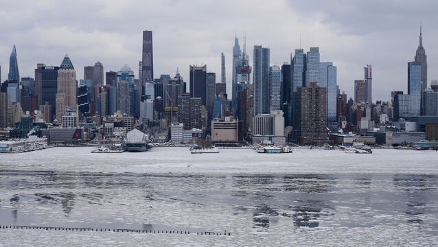 <p>Ice floats on the Hudson River as New York experienced its snowiest day in years (Seth Wenig/AP)</p>