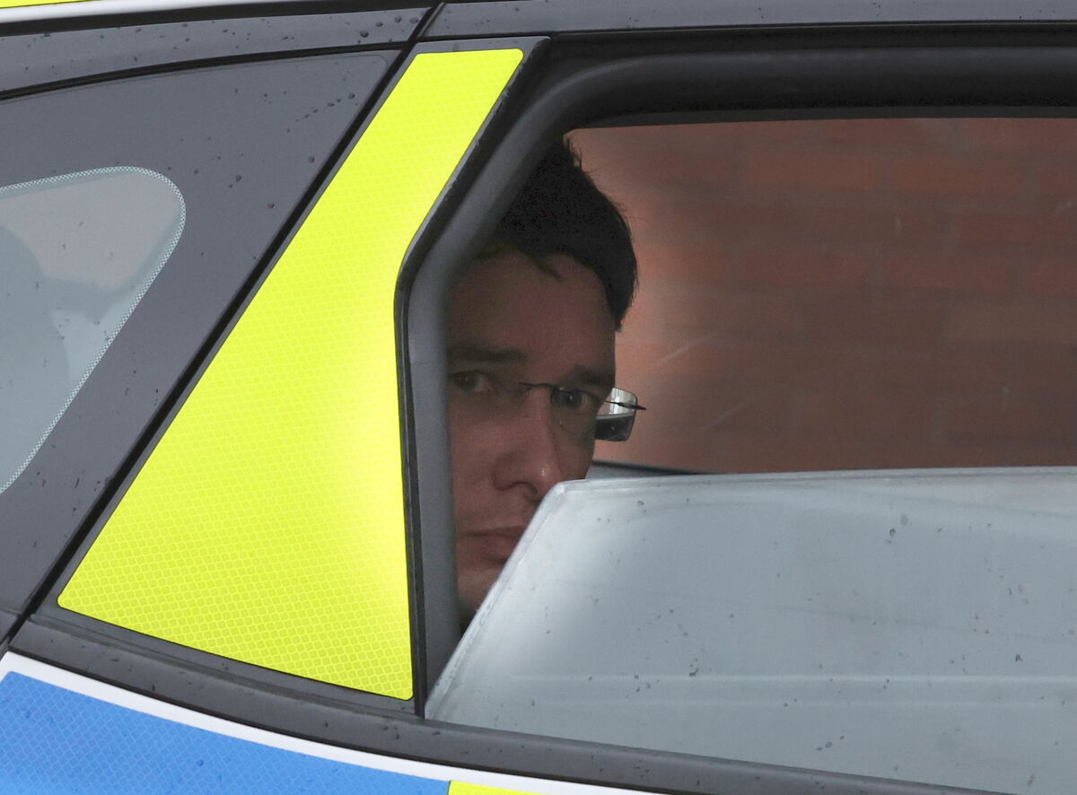 Enoch BUrke arriving at the Four Courts where he was sent back to jail.