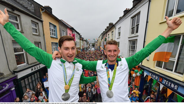 <p>Paul O'Donovan (left) and Gary O'Donovan (right) in Skibbereen celebrating their silver medal success at the 2016 Rio Olympics. Picture: Brendan Moran/Sportsfile</p>