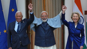 Indian Prime Minister Narendra Modi, center, welcomes European Council President Antonio Costa, left and European Commission President Ursula von der Leyen before their meeting in New Delhi (Manish Swarup/AP)