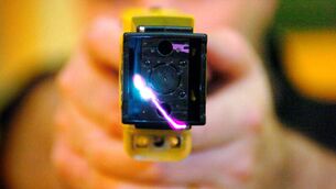 <p>Thomas Browne alleges he was forced to the ground, which was wet with oil and water, before a taser was fired into his lower back. File photo</p>