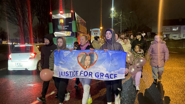 <p>Siobhán Lynch, front, centre, takes part in a walk in memory of her daughter Grace, who died after being hit by a scrambler bike. Picture: Clive Gee</p>