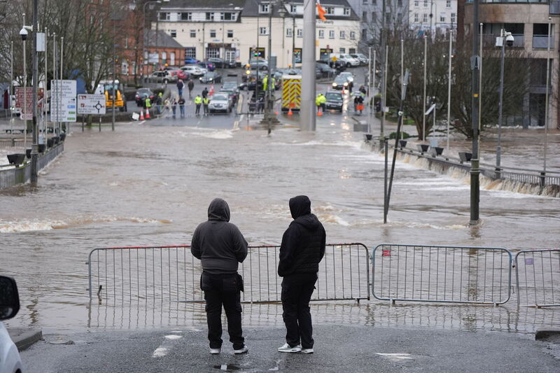 People look at floodwater in Enniscorthy, Co. Wexford. People look at floodwater in Enniscorthy, Co. Wexford.