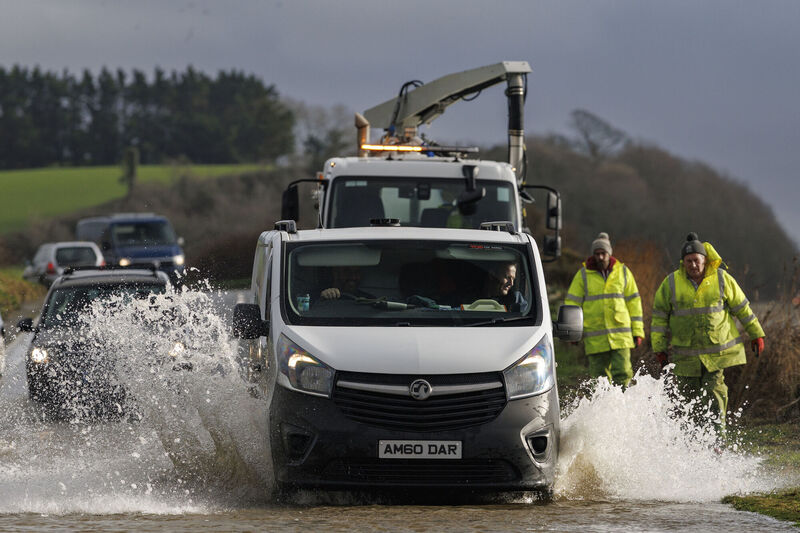 Vehicles pass through a flooded area of the Portaferry Road in Newtownards. Picture: Liam McBurney/PA Wire Vehicles pass through a flooded area of the Portaferry Road in Newtownards. Picture: Liam McBurney/PA Wire