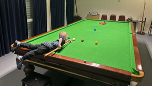 <p>Jude Owens is the youngest person to make a pool bank shot (male) and youngest person to make a snooker double pot (male). Picture: Guinness World Records/PA</p>