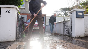 <p>Residents of Grange Park, Rathfarnham, Dublin, as clean up continues after Storm Chandra hit the island of Ireland. Picture: Brian Lawless/PA Wire</p>