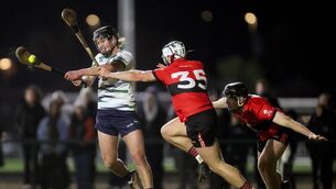<p>LAST FOUR: University of Limerick's Diarmuid Stritch scores a point despite Eoin Downey and Timmy Wilk of University College Cork. Pic: ©INPHO/Laszlo Geczo</p>