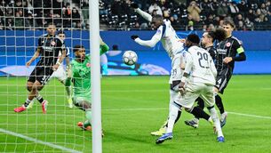 <p>Randal Kolo Muani scores in Tottenham’s 2-0 victory at Eintracht Frankfurt. Pic: DPA/PA</p>