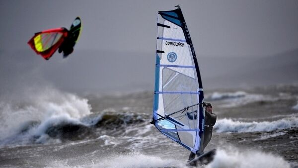 Windsurfers show off their skills in Galway Bay during Storm Dennis on Sunday. Picture: Ray Ryan Windsurfers show off their skills in Galway Bay during Storm Dennis on Sunday. Picture: Ray Ryan