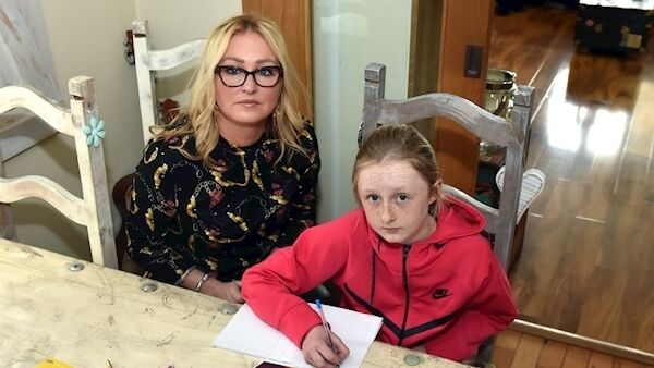 Nicole Reardon and her daughter Clara at home in Saleen looking for a place in an East Cork school. Picture: Eddie O’Hare