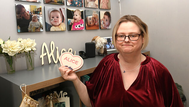 <p>Majella Spang beside a spread of photos of Alice. 'She had the doctors baffled so many times because she fought so hard to live.' Picture: Larry Cummins</p>