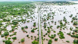 Flood waters covered the Chibuto-Chaimite road in Gaza province, Mozambique (AP)