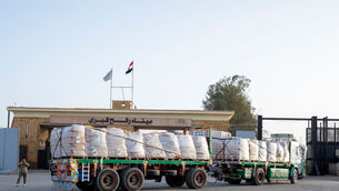 A truck enters the Egyptian gate of the Rafah crossing (Mohamed Arafat/AP)