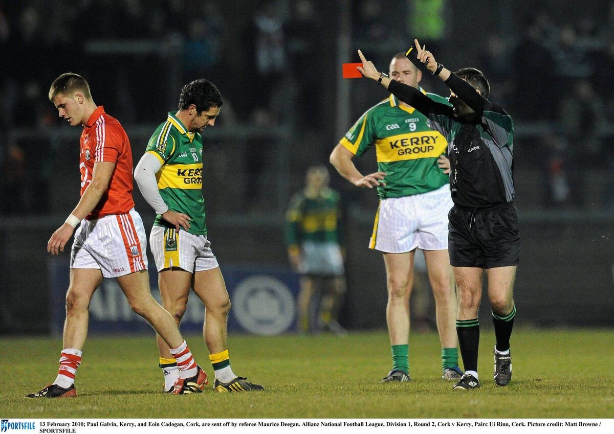 Paul Galvin, Kerry, and Eoin Cadogan, Cork, are sent off by referee Maurice Deeganin February 2010 at Pairc Ui Rinn. Pic: Matt Browne / SPORTSFILE