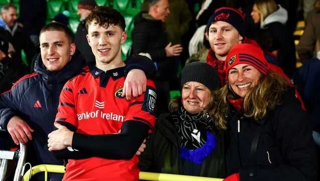 <p>Munster's Tom Wood his brother Gordon, friends and family after the match. Pic: Paul Currie/Impho</p>
