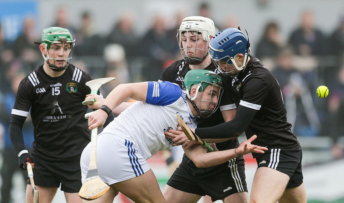 Darragh Ball of St Flannan's is tackled by Patrick Hackett and Eanna Tucker of St. Joseph's CBS, Nenagh. Pic: Natasha Barton/Inpho Darragh Ball of St Flannan's is tackled by Patrick Hackett and Eanna Tucker of St. Joseph's CBS, Nenagh. Pic: Natasha Barton/Inpho