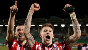 <p>Derry City players, Patrick McClean, left, and James McClean celebrate after the 2026 Men's President's Cup final match between Shamrock Rovers and Derry City at Tallaght Stadium. Pic: Michael P Ryan/Sportsfile</p>