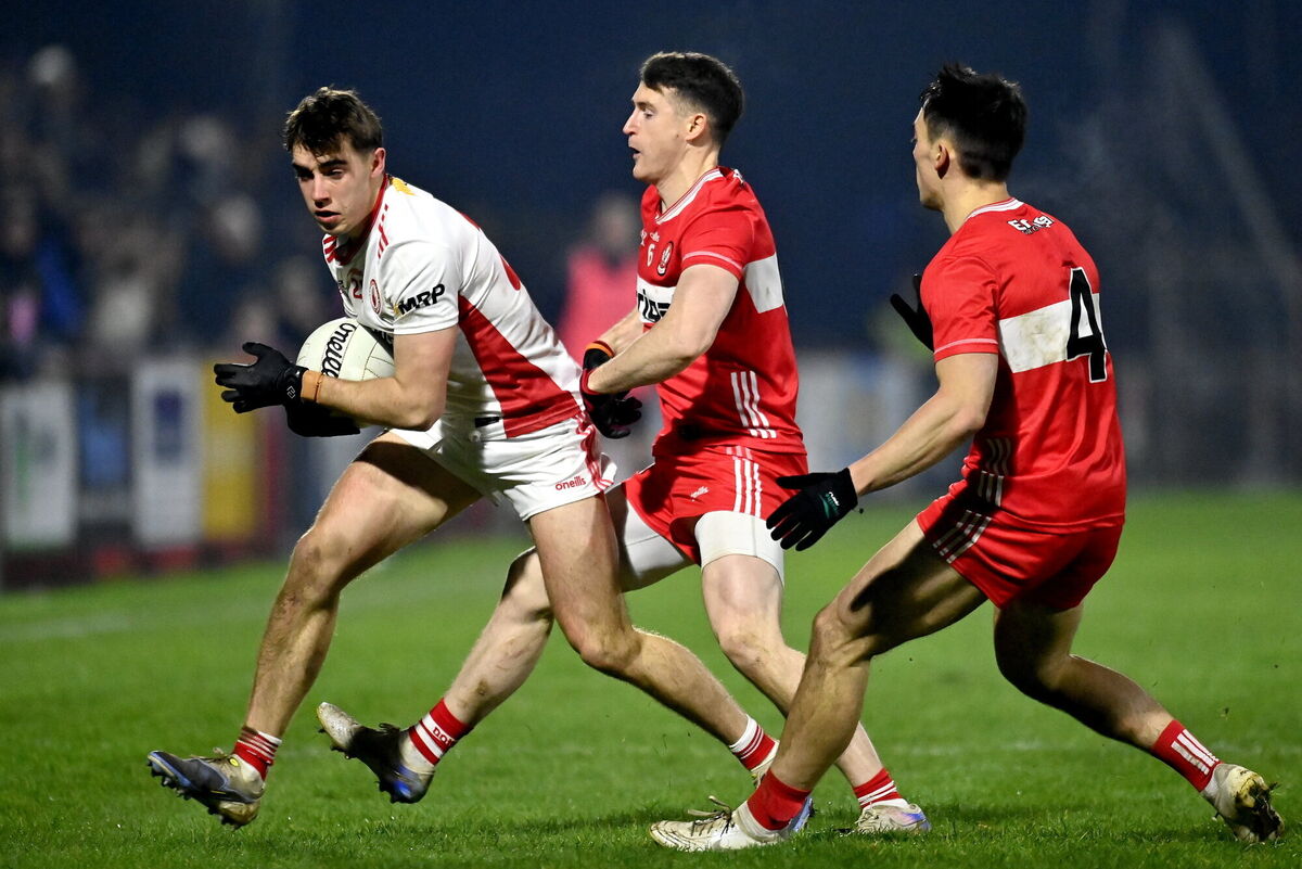 Conor O'Neill of Tyrone in action against Gareth McKinless and Conor McCluskey. Pic: Oliver McVeigh/Sportsfile Conor O'Neill of Tyrone in action against Gareth McKinless and Conor McCluskey. Pic: Oliver McVeigh/Sportsfile