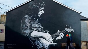 <p>TASTE: Fans arrive for the game between Donegal and Kerry past a Rory Gallagher mural</p> <p>TASTE: Fans arrive for the game between Donegal and Kerry past a Rory Gallagher mural</p>
