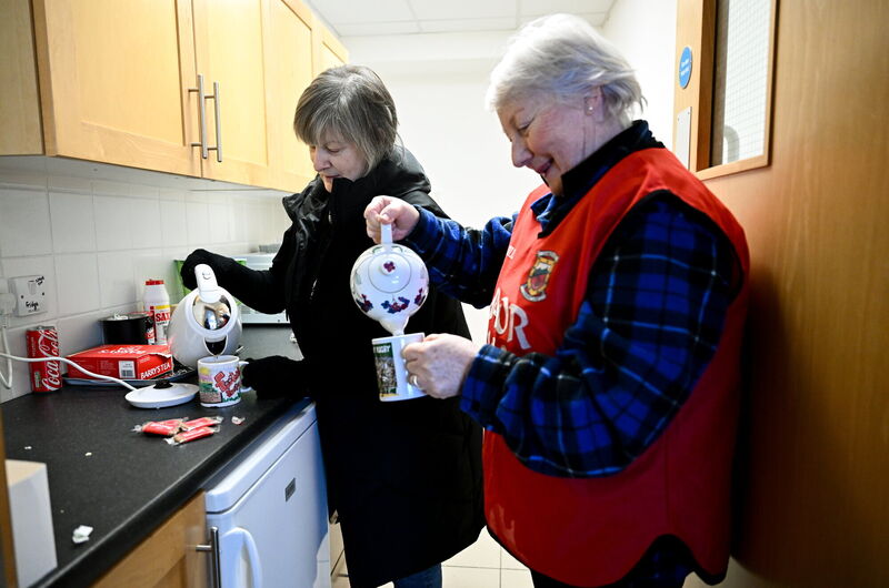 Margaret Gannon, right, and Una Hoban make themselves a cup of tea before the Allianz Football League Division 1 match between Mayo and Dublin at the Hastings Insurance MacHale Park in Castlebar. Pic: Ben McShane/Sportsfile