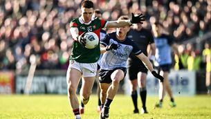 <p>Fergal Boland of Mayo gets away from Conor Tyrrell of Dublin. Pic:Ben McShane/Sportsfile</p> <p>Fergal Boland of Mayo gets away from Conor Tyrrell of Dublin. Pic:Ben McShane/Sportsfile</p>