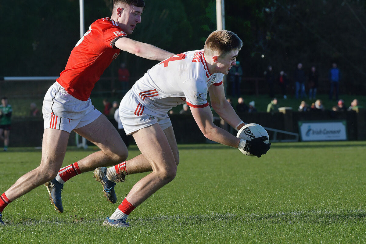  Cork's Tommy Walsh and Dara McDonnell of Louth in action. Pic: Moya Nolan