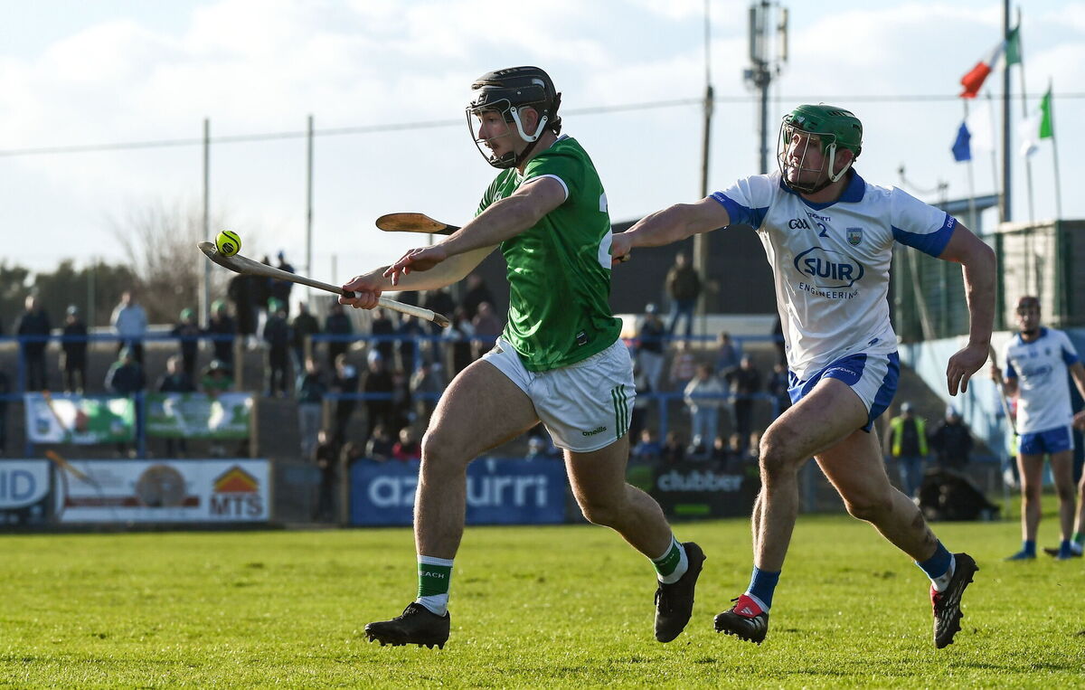 Hugh Flanagan of Limerick is tackled by Mairtín Power of Waterford during the Allianz Hurling League Division 1A match between Waterford and Limerick at Azzurri Walsh Park in Waterford. Photo by Jamie O'Brien/Sportsfile