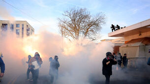 Federal agents deployed tear gas, pepper balls and rubber bullets, witnesses said (Allison Barr/The Oregonian via AP)