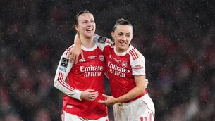 <p>WORLD CHAMPS: Arsenal's Lotte Wubben-Moy celebrates with Katie McCabe. Pic: John Walton/PA Wire.</p>