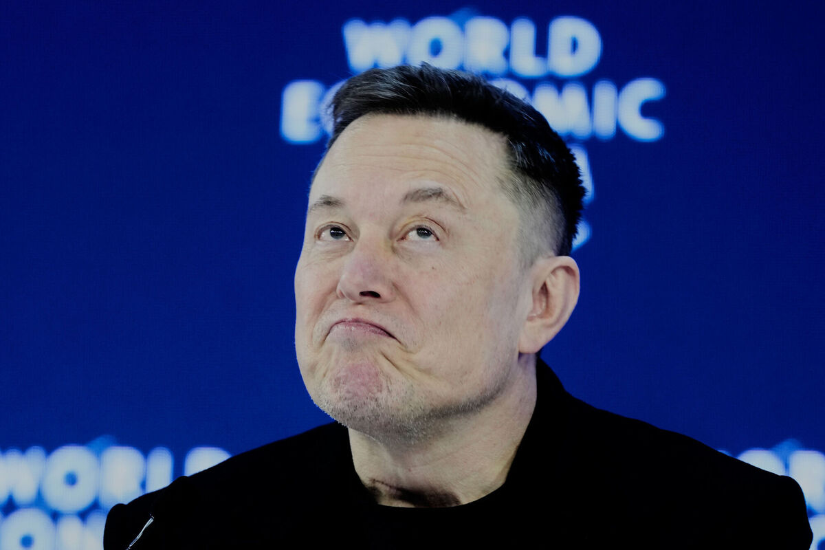 Elon Musk attends the Annual Meeting of the World Economic Forum in Davos, Switzerland, Thursday, Jan. 22, 2026. (AP Photo/Markus Schreiber)