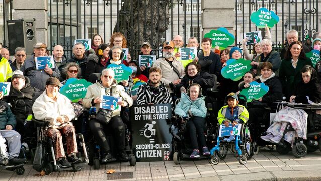 <p>A demonstration outside Leinster House in December by the Disability Coalition warning of the 'heating vs. eating' crisis where it was highlighted that Budget 26 left disabled people €1400 worse off. File photo: Gareth Chaney</p>