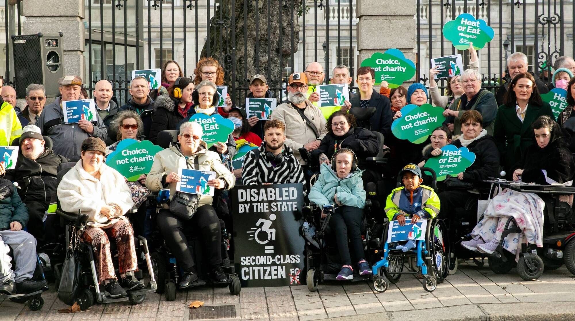 A demonstration outside Leinster House in December by the Disability Coalition warning of the 'heating vs. eating' crisis where it was highlighted that Budget 26 left disabled people €1400 worse off. File photo: Gareth Chaney