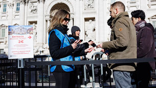 <p>A tourist hands over the fee to get a close look at the Trevi Fountain in Rome Picture: Roberto Monaldo/LaPresse via AP)</p> <p>A tourist hands over the fee to get a close look at the Trevi Fountain in Rome Picture: Roberto Monaldo/LaPresse via AP)</p>
