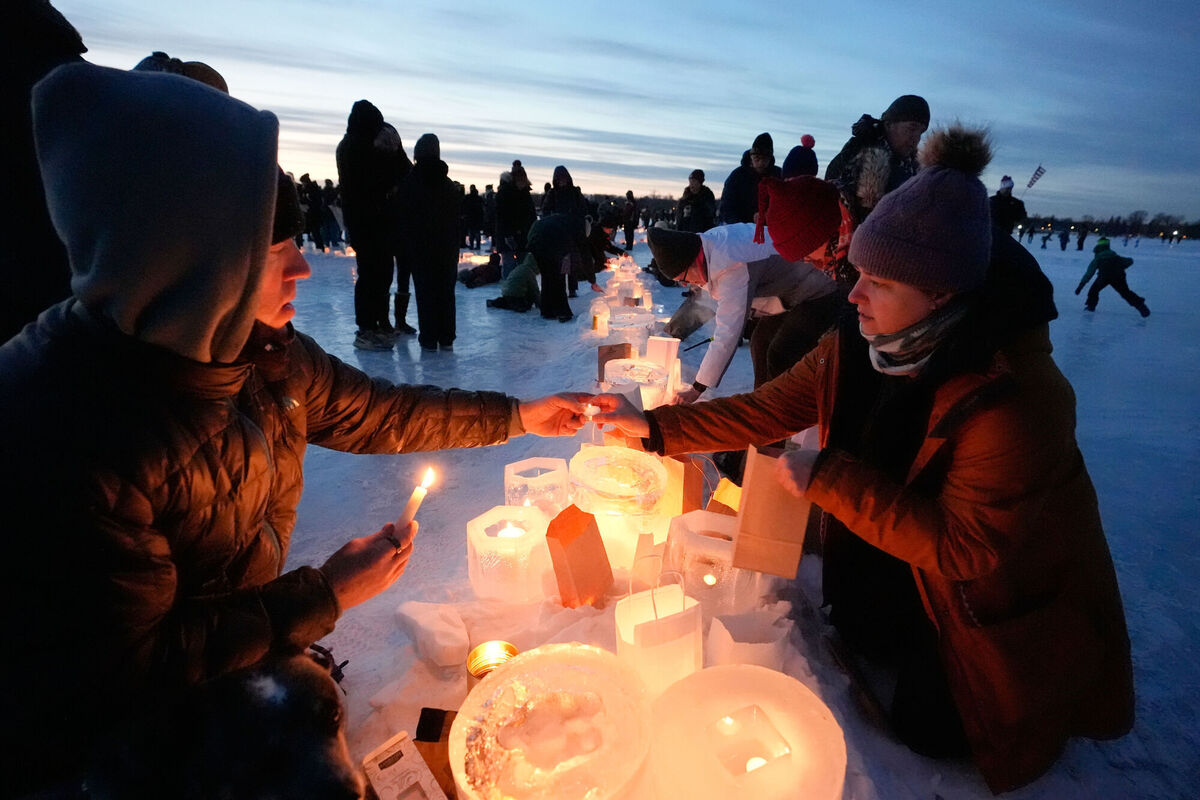 Activists gather in protest to light candles on the frozen Lake Nokomis, spelling, "Ice Out" on Saturday in Minneapolis following violent death of Alex Pretti at the hands and guns of border patrol agents. Photo: AP/Alex Brandon Activists gather in protest to light candles on the frozen Lake Nokomis, spelling, "Ice Out" on Saturday in Minneapolis following violent death of Alex Pretti at the hands and guns of border patrol agents. Photo: AP/Alex Brandon