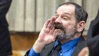 Man convicted of killing three at Jewish sites gives Nazi salute to jury