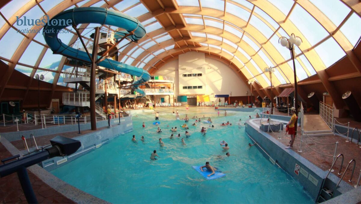 The Blue Lagoon has a heated tropical swimming pool, with a lazy river that veers outdoors, along with a wave machine, and three daredevil slides.