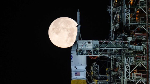 <p>A full moon is seen behind Nasa’s space launch system at the Kennedy Space Centre in Florida (Sam Lott/Nasa via AP)</p>