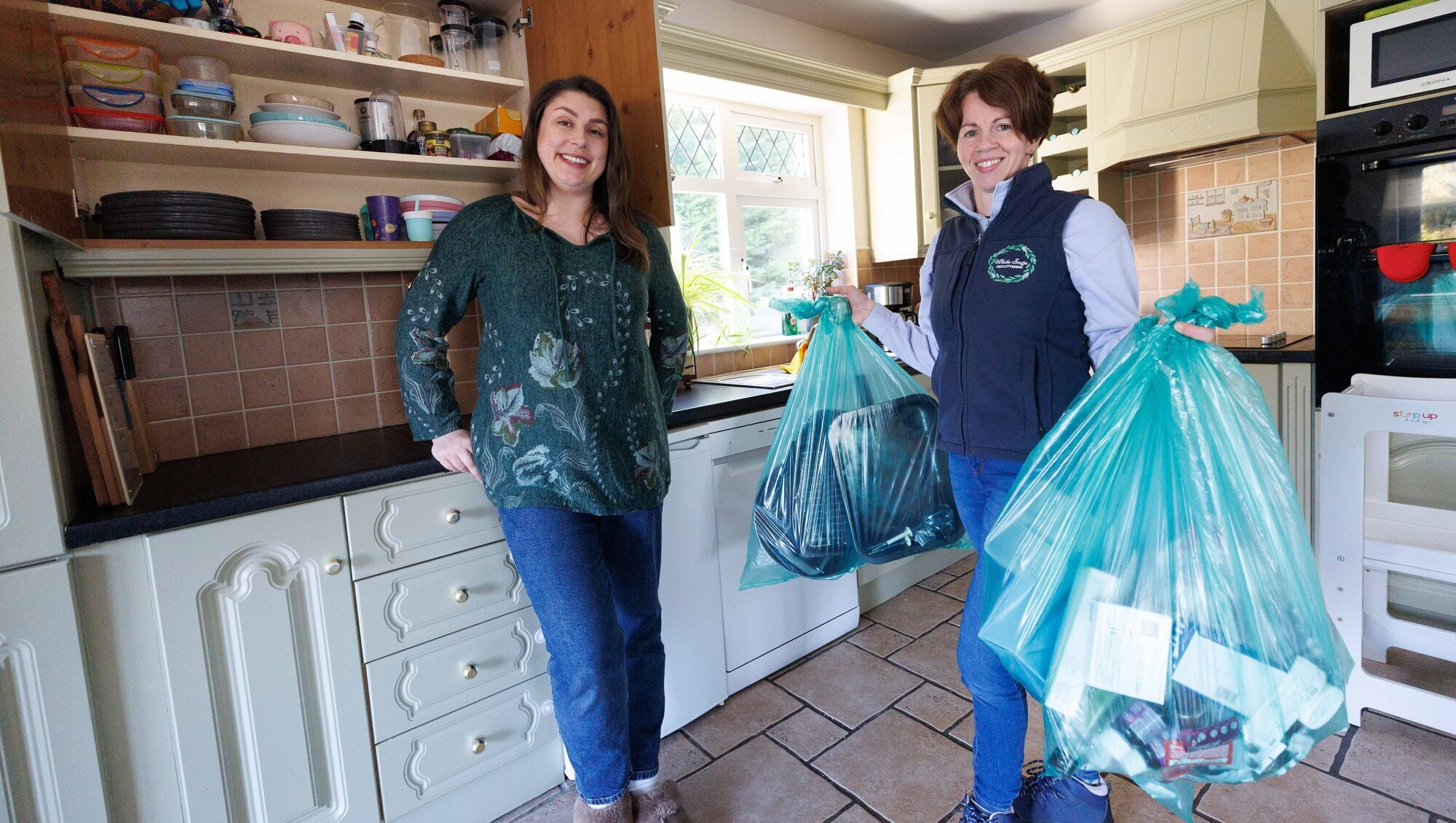 Jess Casey and Anne Marie with some of bags Anne Marie is taking away. Pictures: Eamon Ward