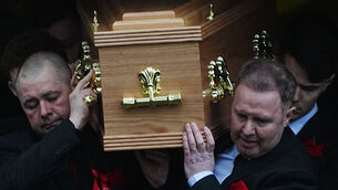 <p>Grace Lynch's father Martin, left, and other family members carrying her remains from the Church of St Oliver Plunkett, Rivermount, Dublin, after her funeral Mass. The 16-year-old died after being hit by a scrambler motorbike in Finglas. Picture: Brian Lawless/PA</p>