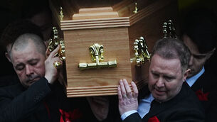 <p>Grace Lynch's father Martin, left, and other family members carrying her remains from the Church of St Oliver Plunkett, Rivermount, Dublin, after her funeral Mass. The 16-year-old died after being hit by a scrambler motorbike in Finglas. Picture: Brian Lawless/PA</p>