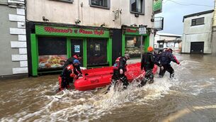 <p>Members of Slaney Search and Rescue working in floodwater in Enniscorthy last week. Picture: Niall Carson/PA Wire</p>
