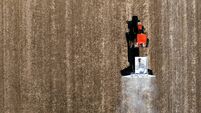 Aerial View of Tractor, Preparing the Potato Field For The New Season
