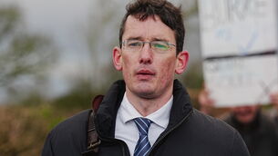 <p>Enoch Burke outside Wilson’s Hospital School in Co Westmeath having been refused entry (PA)</p>